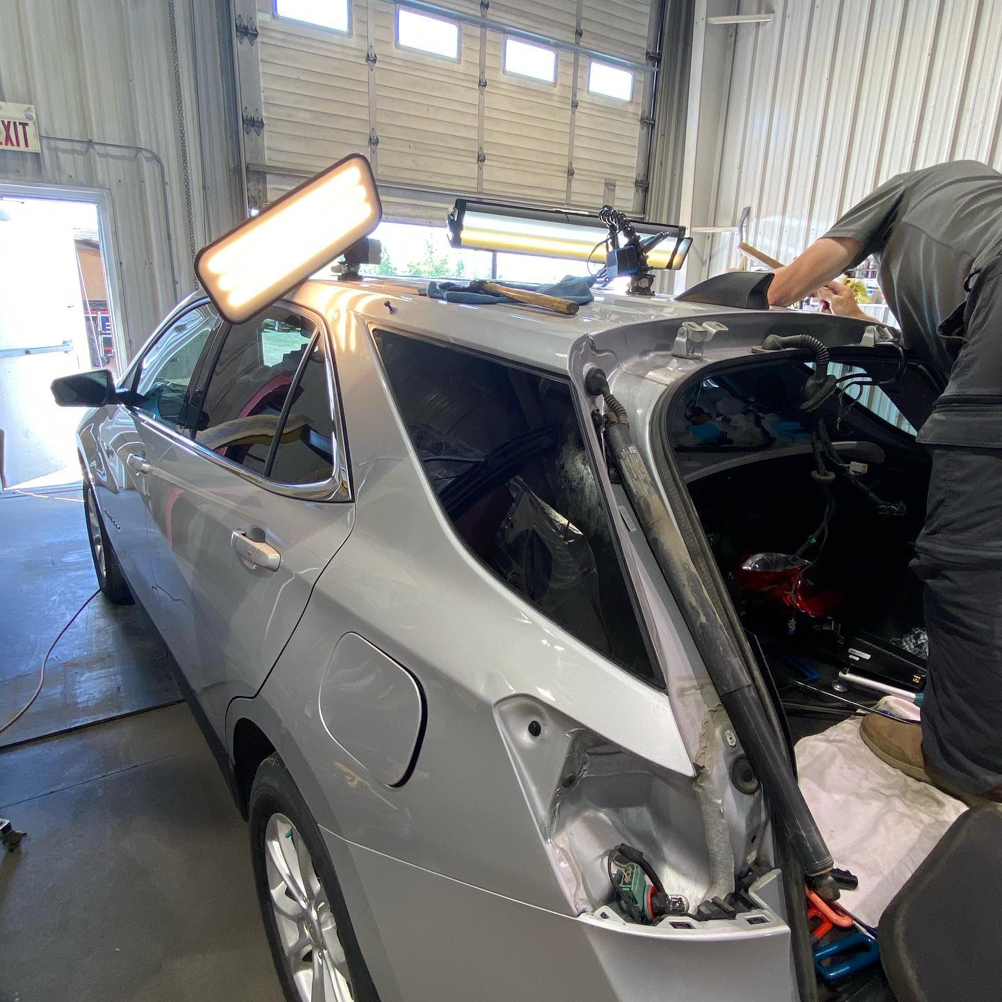 Repaired dark metallic gray car door