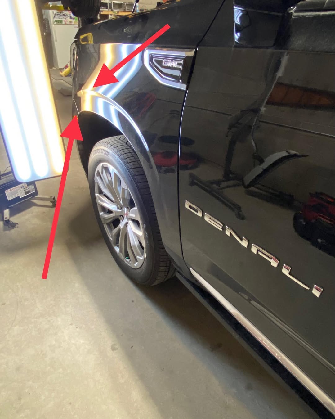 Repaired dark green car body panel