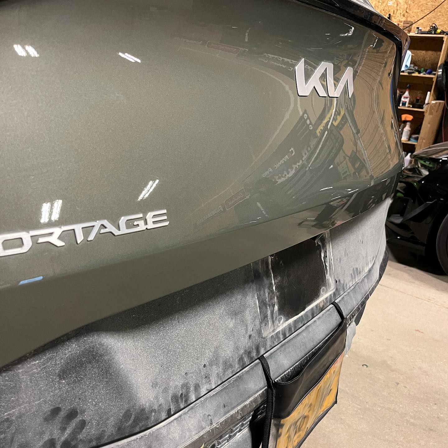 Clean glossy dark gray car panel